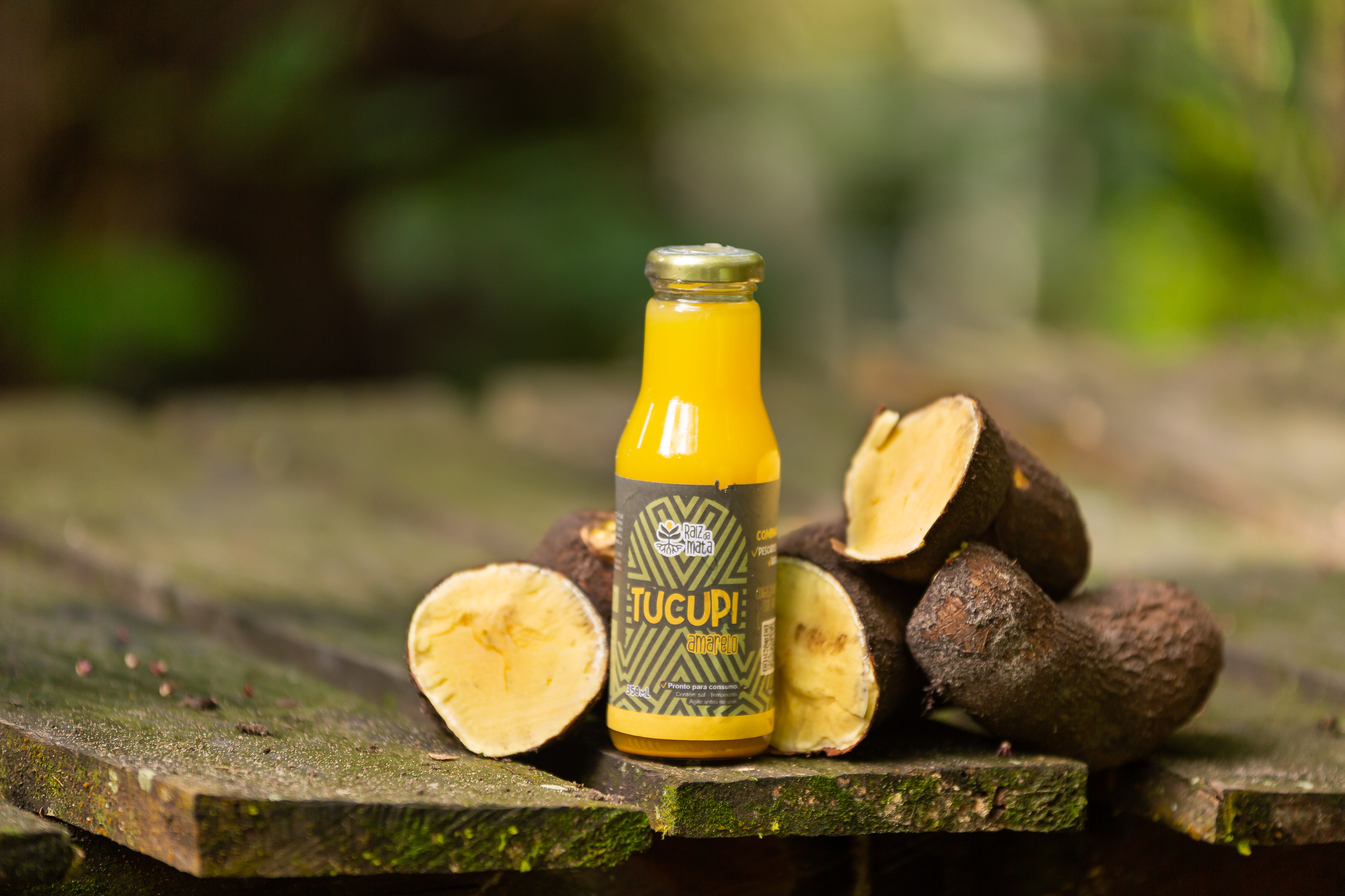 a bottle of oil and some fruit