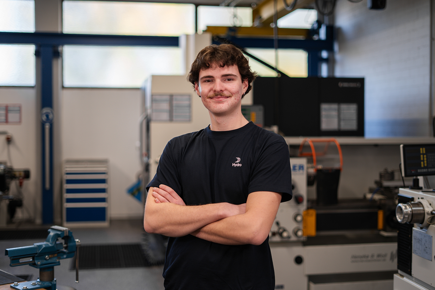 a man standing in a factory