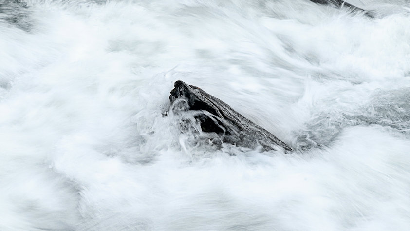 a rock in a river