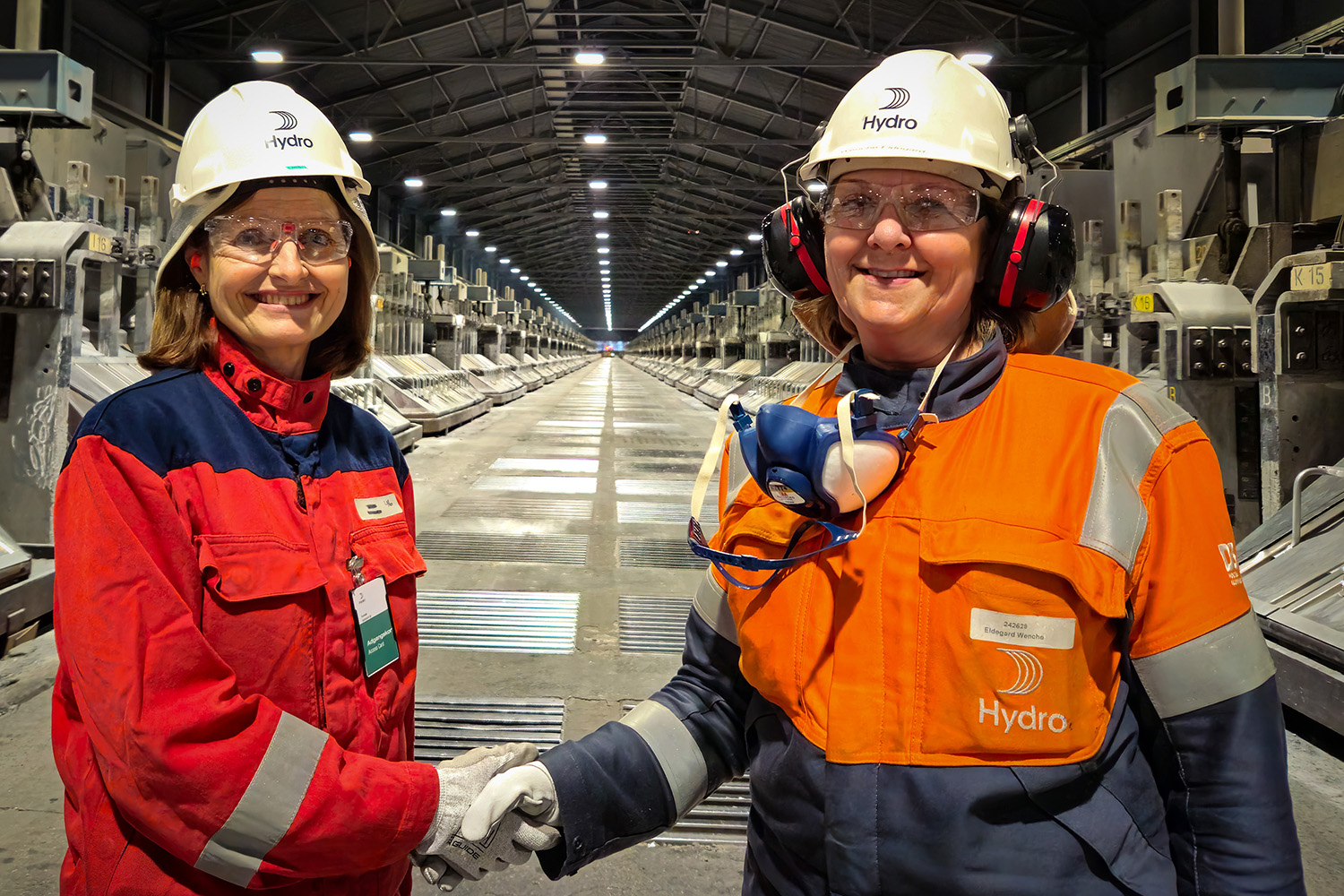 a couple of people wearing helmets and goggles