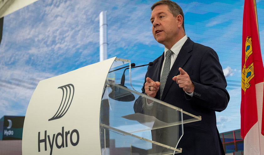 a man speaking at a podium