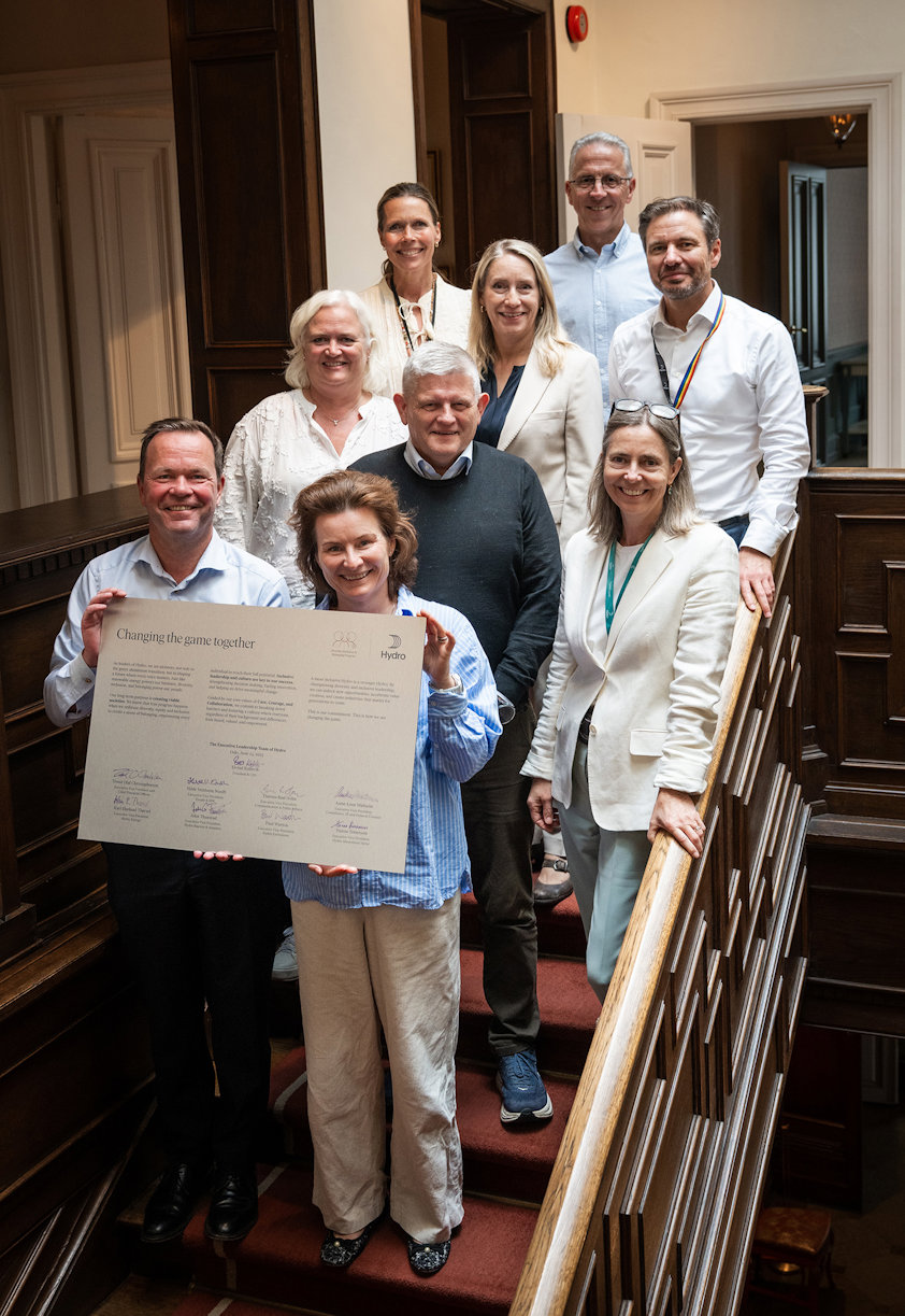 a group of people posing for a photo