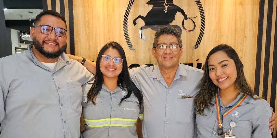 a group of people posing for a photo