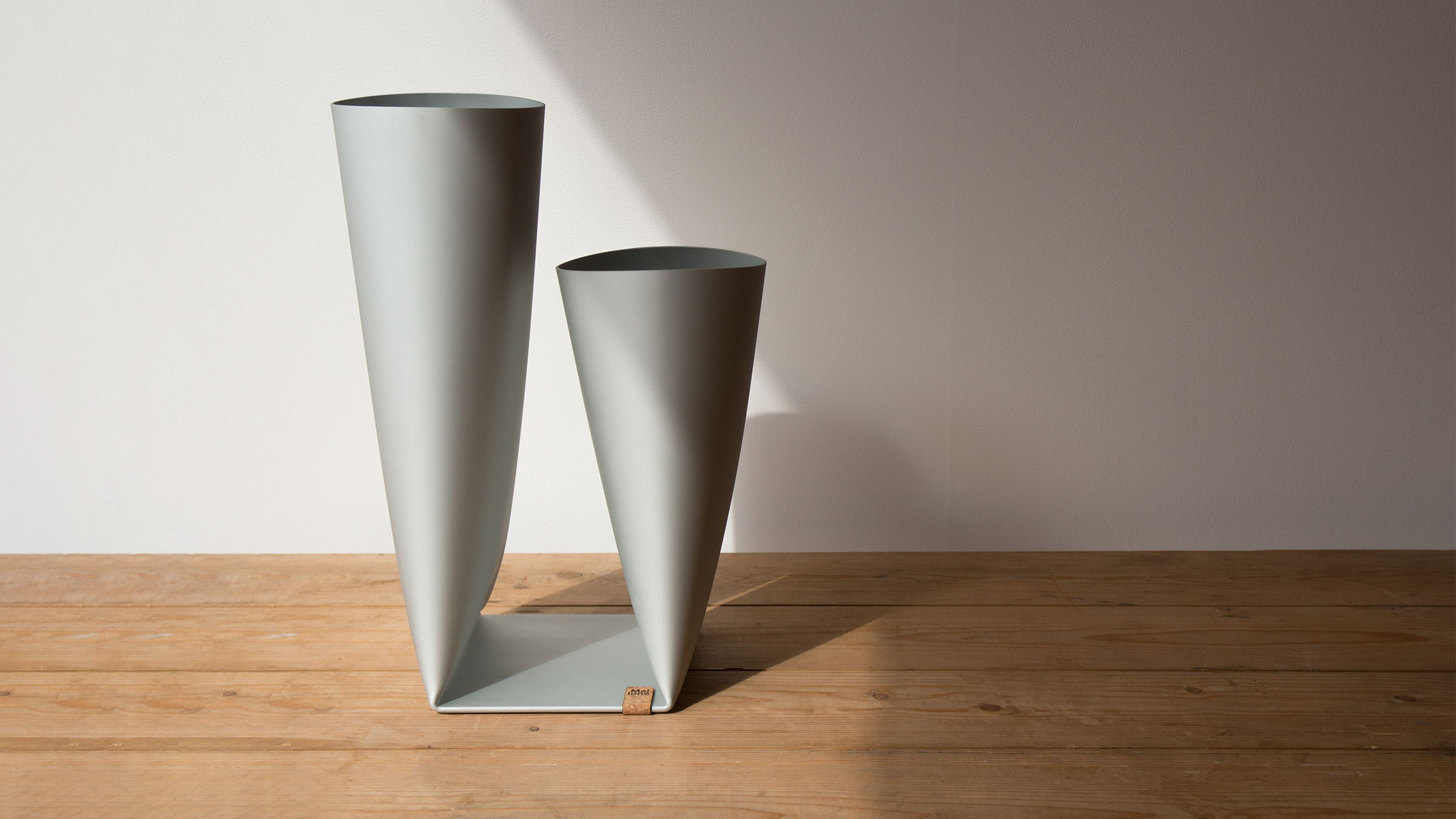 a pair of vases on a table