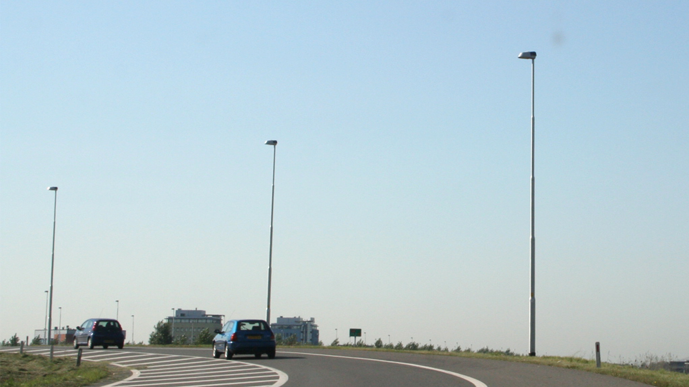 Aluminium light poles beside a road