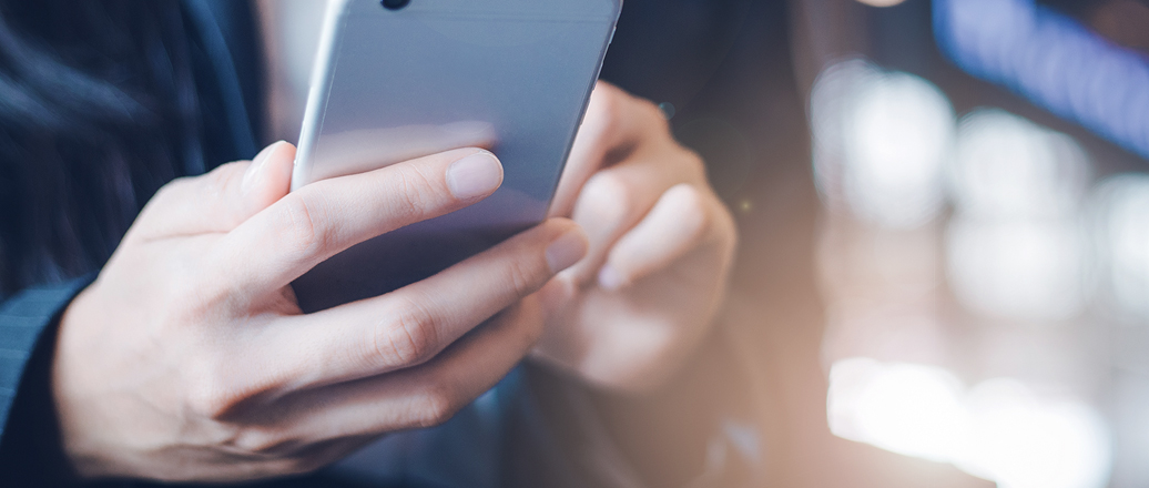 hands holding a smartphone