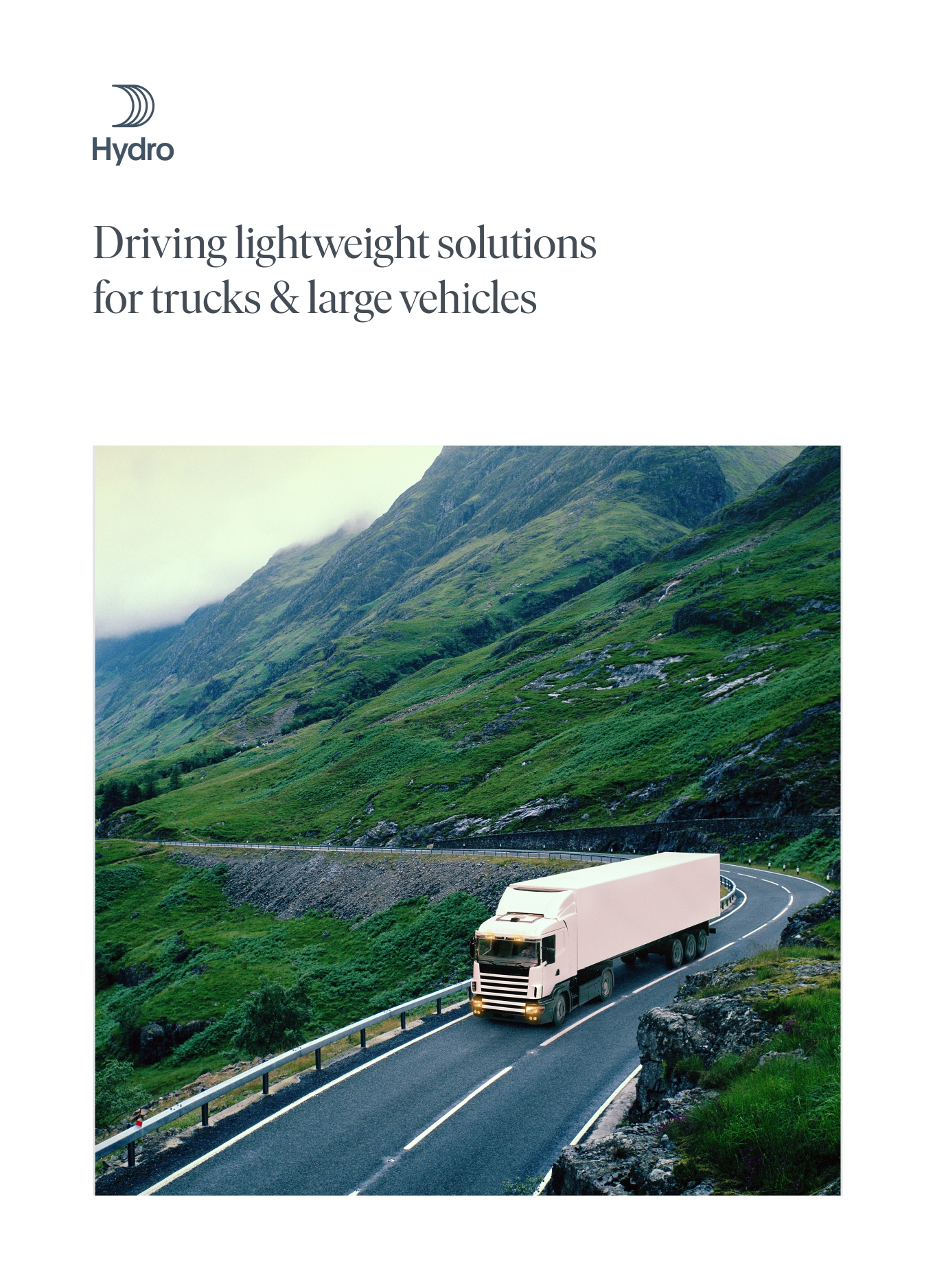 a truck driving down a road