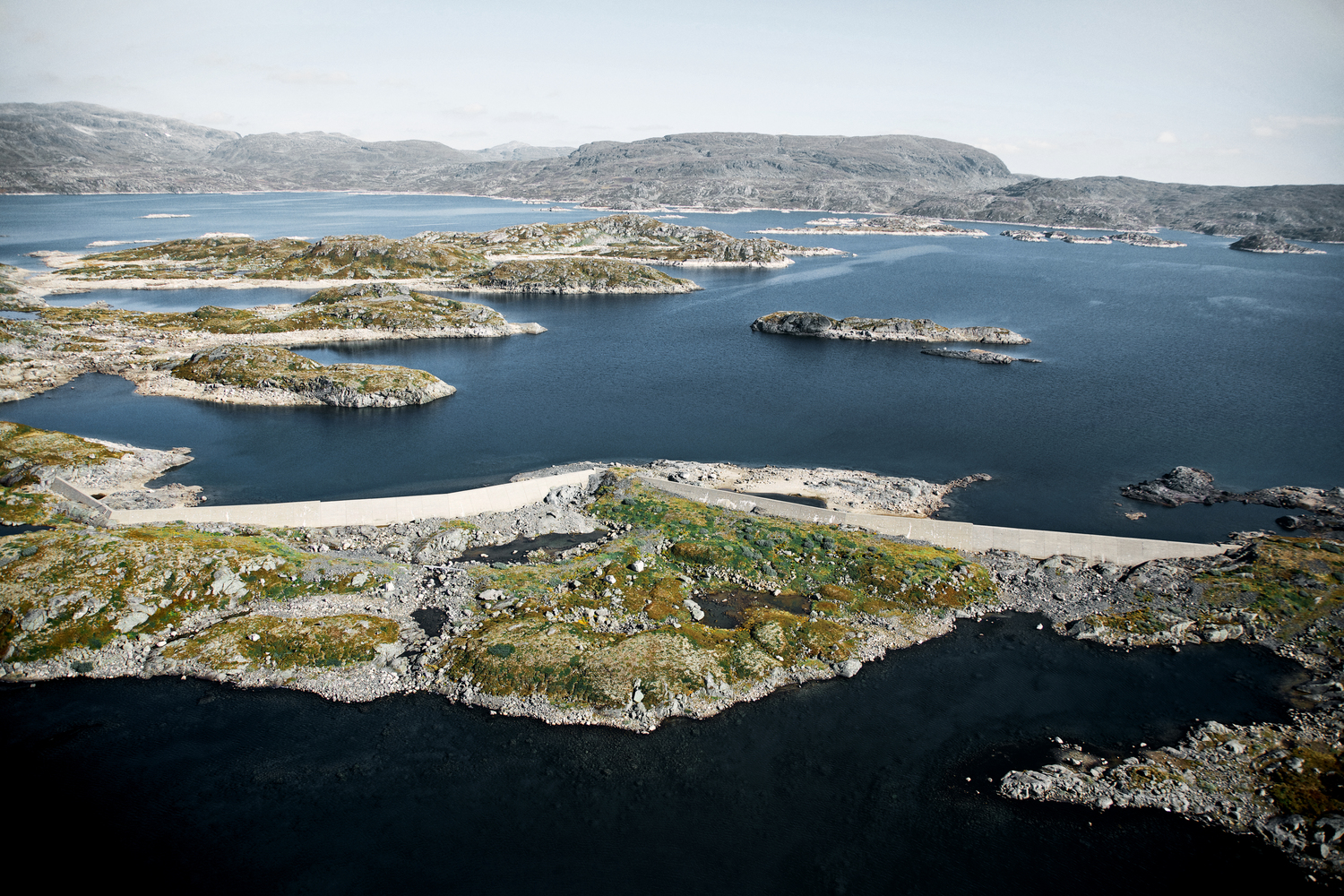 a body of water with islands in it