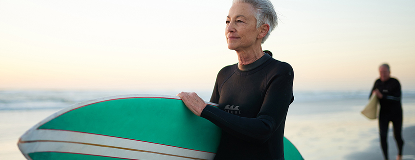 a person holding a surfboard